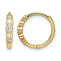 A pair of gold hoop earrings with five round white diamonds set in bezel settings along the front edge of each hoop.
