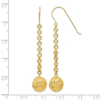 Gold-toned dangle earrings with textured spheres suspended from delicate chain links, shown next to a ruler measuring approximately 2.5 inches in length.