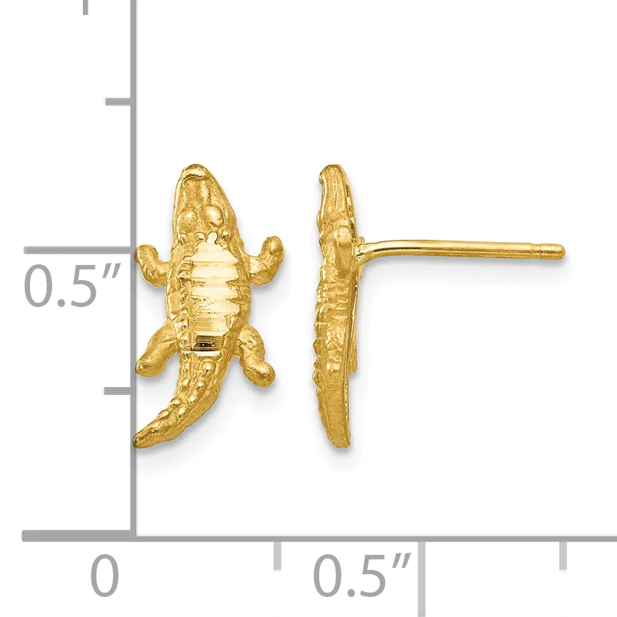 Gold-colored crocodile or alligator stud earrings shown front and back view next to a measurement scale.