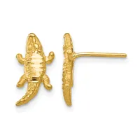 Gold crocodile stud earrings shown from front and side views, featuring textured details and straight posts with flat backs.