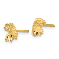A pair of gold eagle head stud earrings with textured feather detailing and posts, shown from the front against a white background.