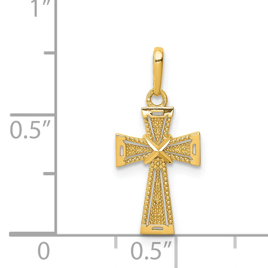 Gold cross pendant with textured surface and bow-tie shaped arms, shown next to a measurement scale indicating approximately one inch in height.