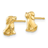A pair of gold dog-shaped stud earrings with detailed features shown against a white background.