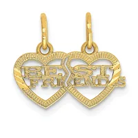 Two connected gold heart-shaped pendants with textured borders, each containing cutout text reading "BEST FRIEND" and "BEST FRIENDS," with attached bail loops.