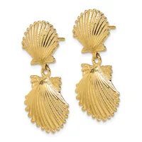 A pair of gold shell-shaped dangle earrings with textured radiating lines, featuring small bow connectors between the upper and lower shells.