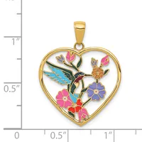Gold-toned heart-shaped pendant with colorful enamel hummingbird and flowers, shown with measurement scale indicating approximately one inch in height.