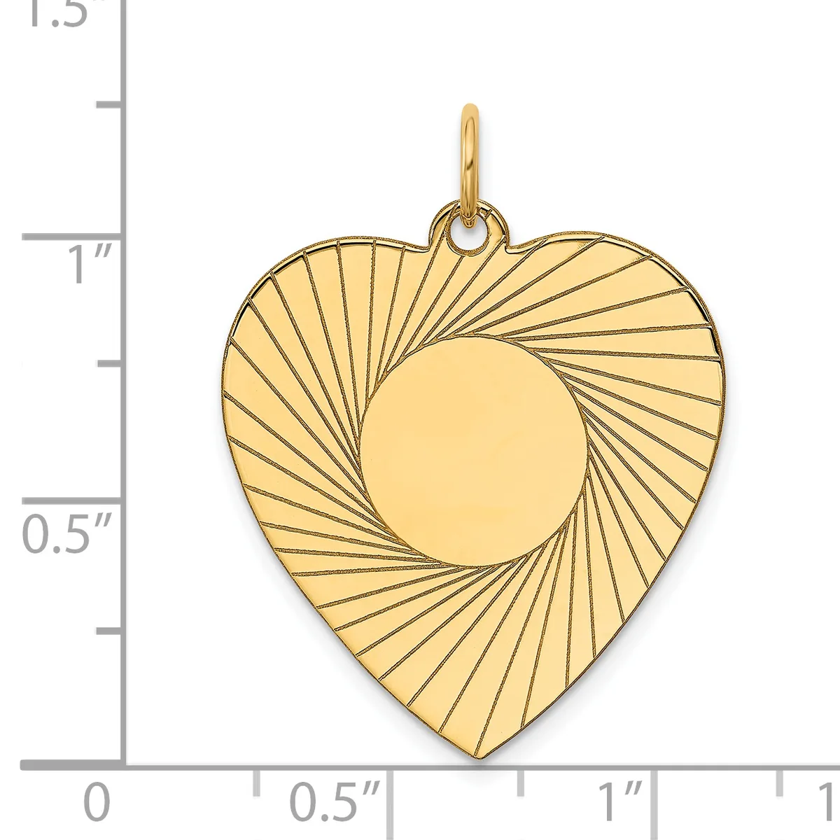 Gold heart-shaped pendant with radiating line pattern and circular cutout in center, displayed against a measurement scale.