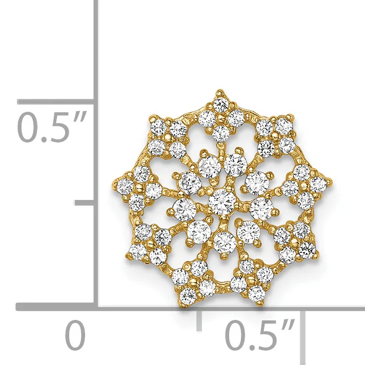 A gold snowflake-shaped pendant with diamond accents shown against a measurement scale indicating it is approximately 0.5 inches wide.