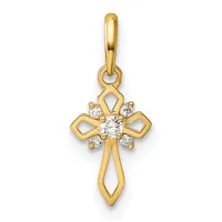 A gold cross pendant with a center round diamond surrounded by smaller diamonds, featuring curved cutout sections on the arms and a looped bail at the top.