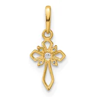 Gold cross pendant with decorative bow-shaped tops on each arm and a small round white stone in the center, suspended from a gold bail.
