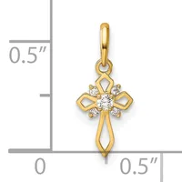 Gold cross pendant with diamond accents and open cutout details, shown next to a ruler indicating approximately 0.5 inches in width and height.