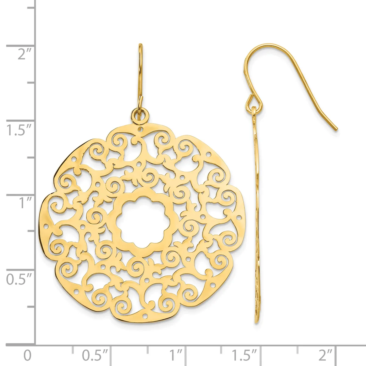 Gold-colored ornate circular filigree earrings with scrollwork patterns and matching shepherd's hook ear wires, displayed next to a ruler showing approximately two inches in length.