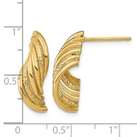 Gold curved hoop earrings with textured linear pattern detail, shown next to a measurement scale indicating approximately one inch in length.
