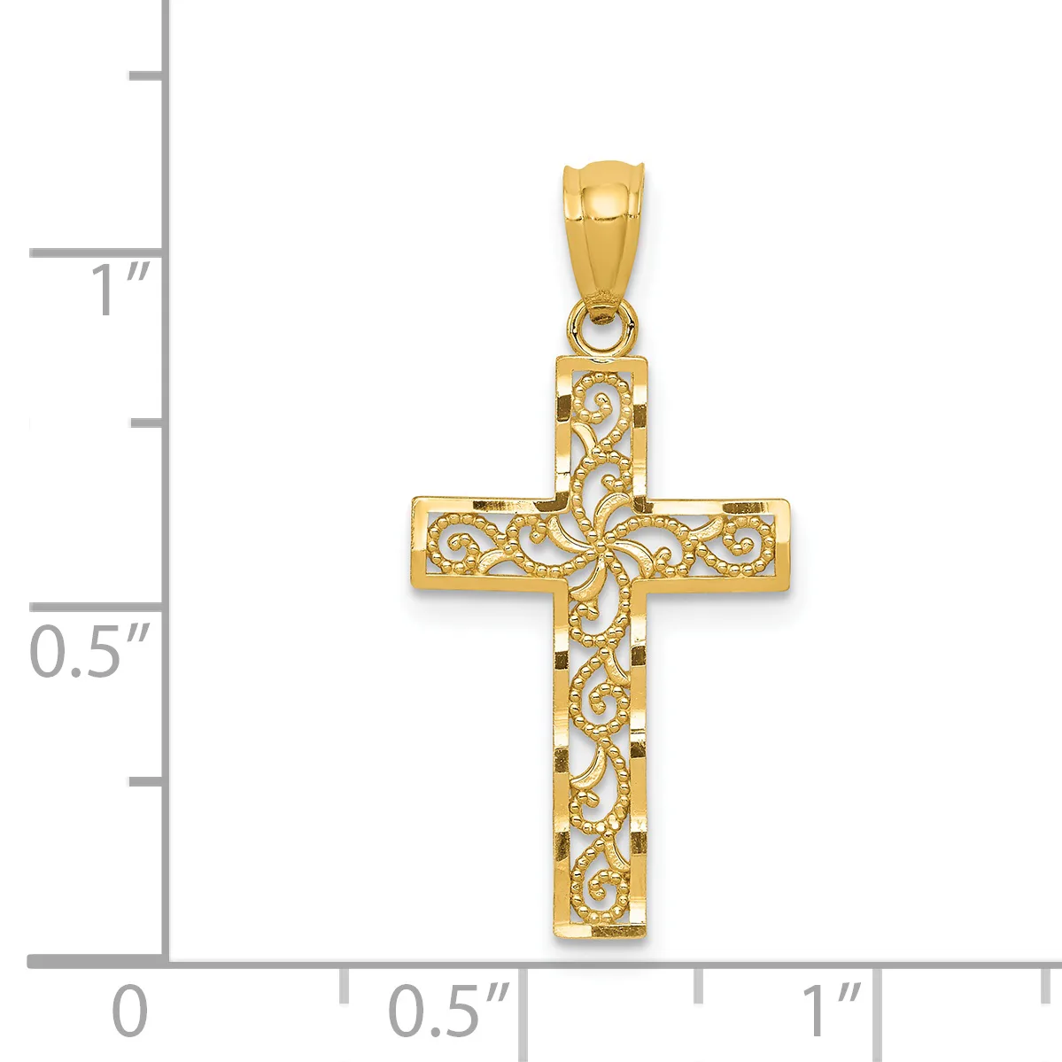 Gold cross pendant with ornate scrollwork filigree pattern shown next to a measurement scale indicating approximately one inch in height.