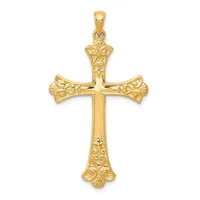 Gold cross pendant with ornate floral filigree detailing on the arms and shaft, displayed against a white background.
