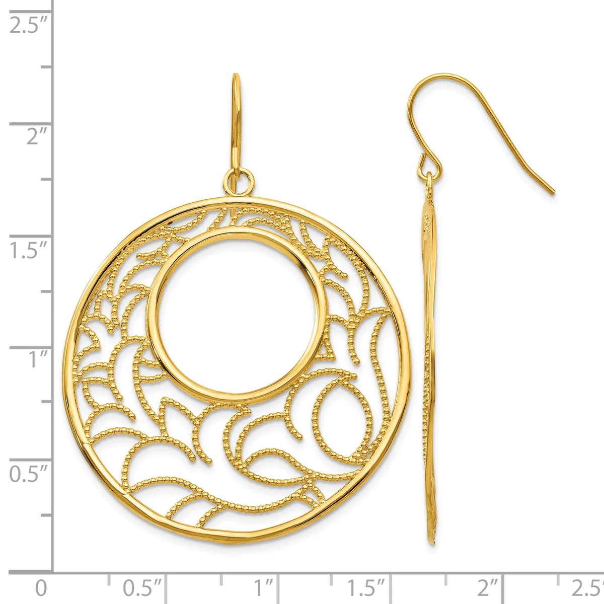 Gold-toned filigree circular earrings with an ornate leaf pattern and a central open circle, displayed next to a measurement ruler showing approximately 2 inches in diameter.