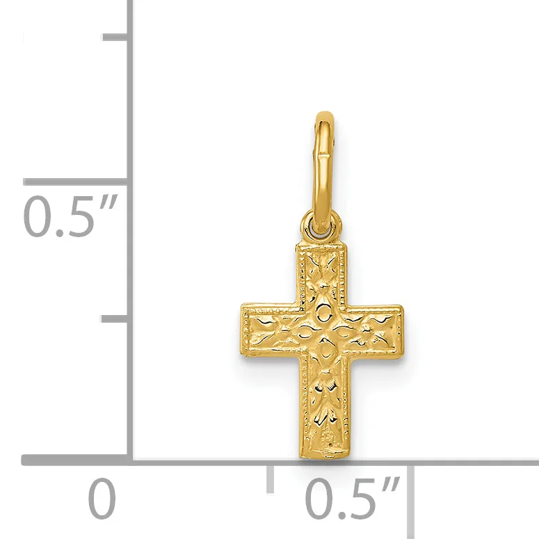 A gold cross pendant with textured surface and loop bail, shown next to a measurement scale indicating approximately 0.5 inches in width and height.