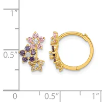 Gold hoop earrings with clustered flower-shaped charms set with purple and pink gemstones and clear crystals, shown next to a ruler for scale.