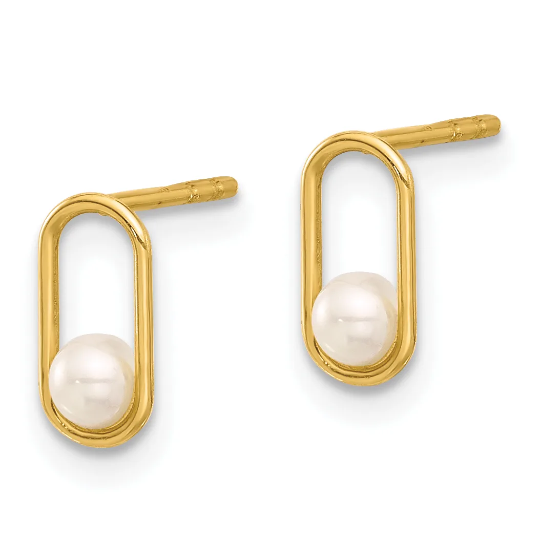 A pair of gold stud earrings featuring oval frames with white pearls suspended inside, displayed against a white background.