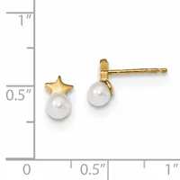 Gold star stud earrings with white pearl drops, displayed against a measurement scale showing approximately 0.5 inches in height.