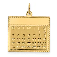 Gold calendar pendant with a decorative scalloped border, showing months abbreviated as SMTWTES and numbered dates 1 through 30 arranged in rows.