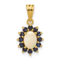 Gold pendant with an oval opal center stone surrounded by a halo of dark blue sapphires set in gold prongs.