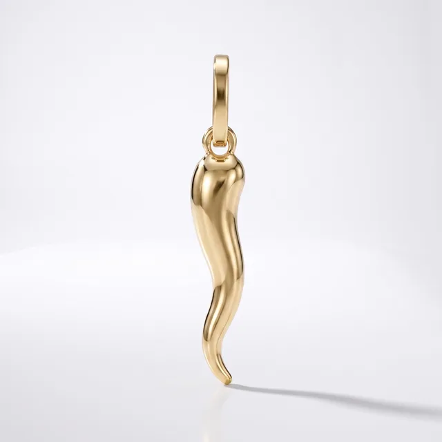 A polished gold curved horn-shaped pendant with a looped bail at the top, displayed against a white background.