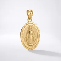 Gold oval religious medal pendant with relief image of a robed figure and text around the border, suspended from a gold bail on white background.