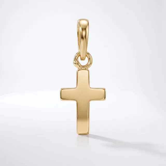 A gold cross pendant with a polished finish and rounded edges, suspended from a matching gold bail, displayed against a white background.