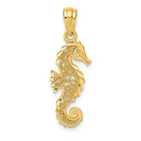 A gold seahorse pendant with ornate filigree detailing throughout its body and a scrolled tail, shown suspended from a bail against a white background.