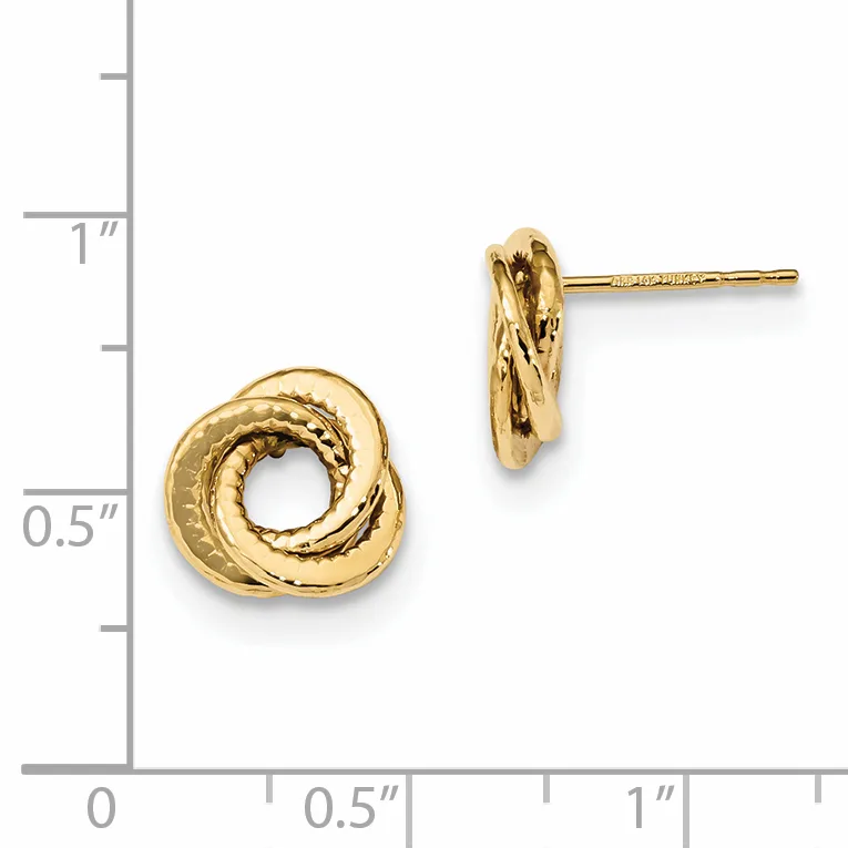Gold-toned twisted knot stud earrings displayed next to a measurement ruler showing approximately half-inch diameter.