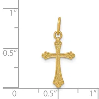 Gold-colored cross pendant with ornate floral detailing on the arms, shown against a measurement scale indicating approximately one inch in height.