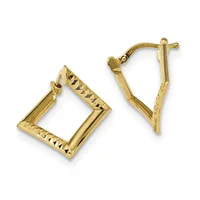 Pair of gold-toned chunky rectangular hoop earrings with diagonal diamond-cut texture on the outer edges, displayed against a white background.