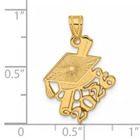 Gold-toned graduation cap pendant with decorative scrollwork base, shown next to a ruler measuring approximately one inch tall.