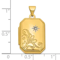 Gold-toned rectangular locket pendant with decorative scrollwork on the lower left, a star accent, and a measurement scale showing approximately one inch in height.