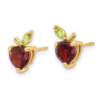A pair of gold stud earrings shaped like apples with deep red faceted gemstone bodies and small green faceted gemstone leaves on top.