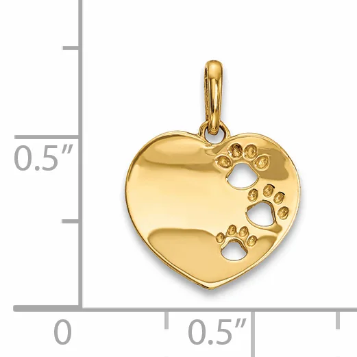Gold-colored heart-shaped pendant with three paw print cutouts and a small stamped hallmark, shown against a measurement scale.