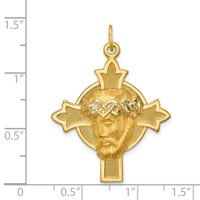 Gold pendant featuring a cross with a bearded face wearing a crown at the center, flanked by two stars, shown next to a measurement scale indicating approximately 1.25 inches in height.