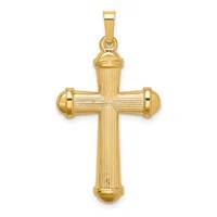 A polished gold cross pendant with vertical linear detailing and rounded knob accents at the ends of each arm, suspended from a bail loop.