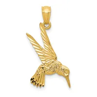 A gold hummingbird pendant with detailed wings and body, shown suspended from a gold bail against a white background.