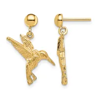 Pair of gold hummingbird dangle earrings shown from front and back views, featuring detailed bird charms suspended from polished ball studs.