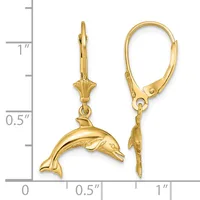 Gold dolphin charm earrings with lever backs displayed next to a ruler showing approximately one inch in length.