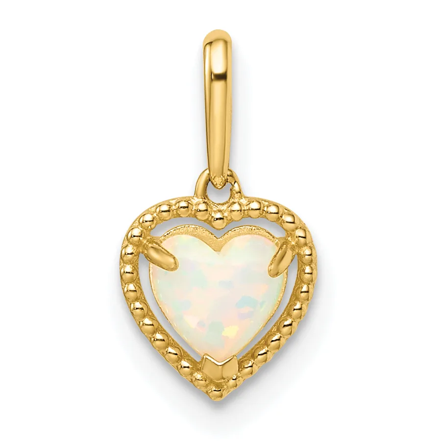 Gold heart-shaped pendant with white opal center stone, beaded gold border, and hanging bail, shown against white background.