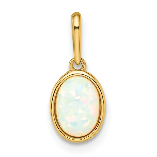 A gold oval pendant with a bezel-set white opal cabochon stone, suspended from a gold bail loop.