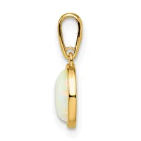 Gold pendant with an oval bail at the top and a polished pale green opal stone set in a bezel-style gold frame.