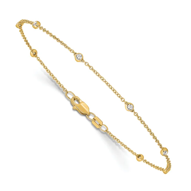 Gold chain bracelet with small round diamond accents spaced along the length, featuring a lobster clasp closure.
