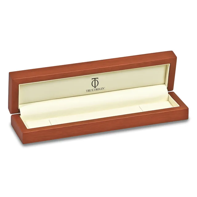 An open wooden jewelry box with a reddish-brown finish and cream-colored interior lining, displayed at an angle against a white background.
