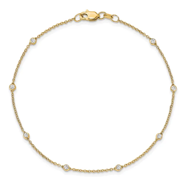 A gold chain bracelet with evenly spaced round diamond stations and a lobster clasp closure, displayed on a white background.