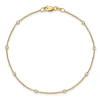 A gold chain bracelet with evenly spaced round diamond stations and a lobster clasp closure, displayed on a white background.