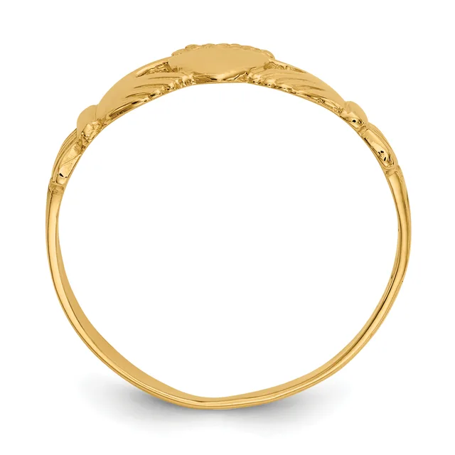 A yellow gold signet ring with an oval engraving plate, decorative rope border, textured scroll detailing on the shoulders, and a slim polished band, photographed from the side.